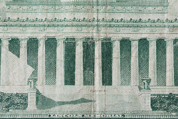 istock Macro Lincol Memorial on five dollar bill 472337704