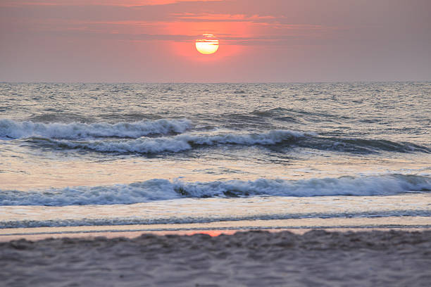 istock Beautiful sunrise on the beach 472339560