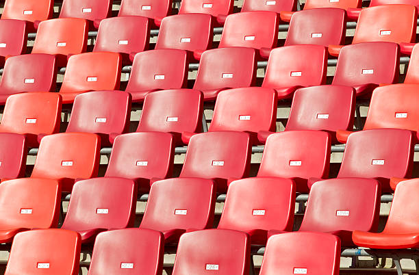 istock Sports stadium chairs 472341706