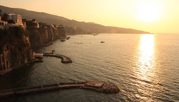 istock Sun sets over the bay in Sorrento 472345628