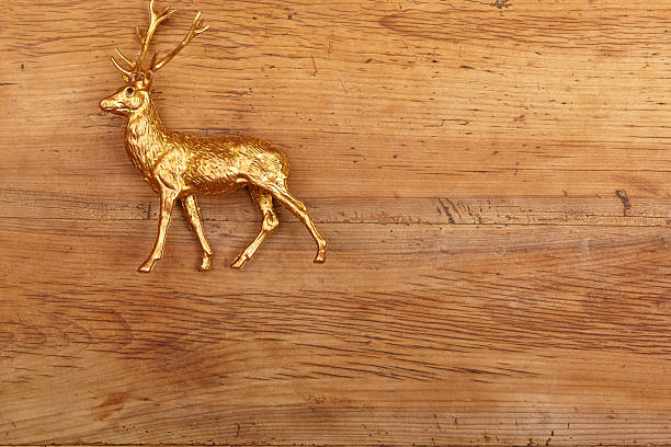istock Deer figure on wood 472345860