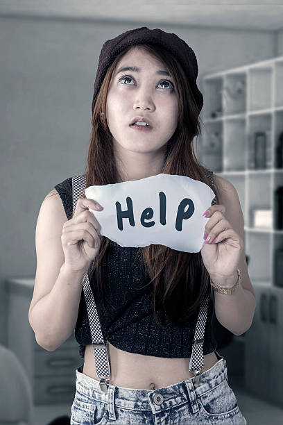 desesperación chica necesita ayuda - japanese ethnicity college student asian ethnicity asian and indian ethnicities fotografías e imágenes de stock