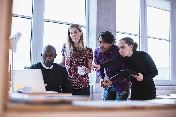 istock Business professionals looking at the project 472347360