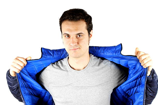 istock Studio shot of a young man with blue anorak 472347380