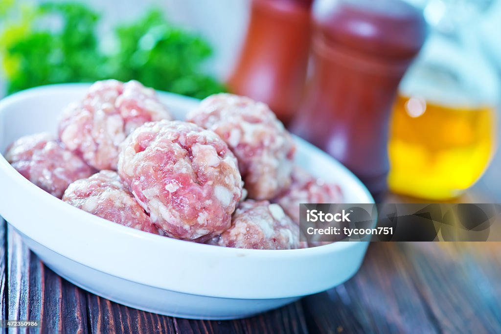 raw meatballs raw meatballs on plate and on a table Kofta Stock Photo