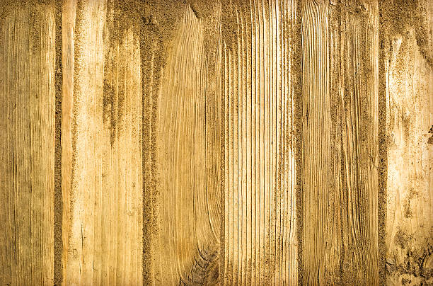 istock Sand on planked wood background - closeup. 472351258