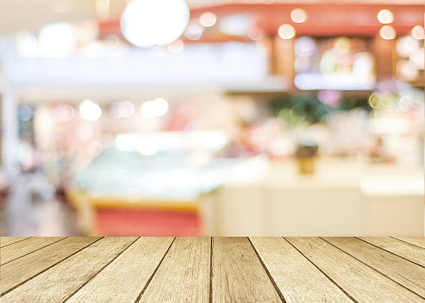 istock Perspective wood and blurred cafe with bokeh light background 472354012