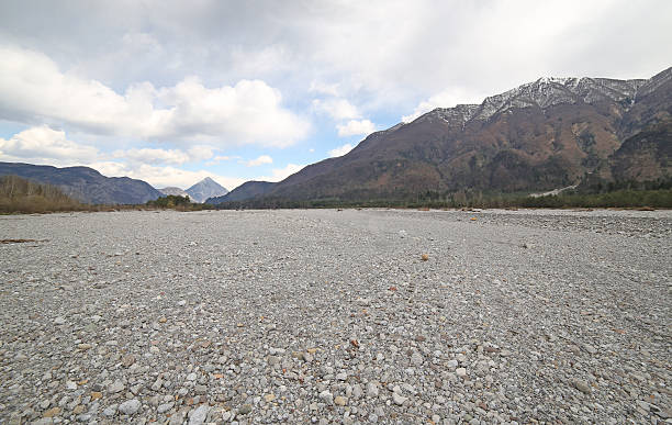 istock river bed with many cobblestone and rocks 472354350