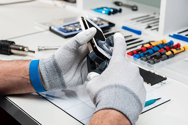 Technician repairing a smarphone