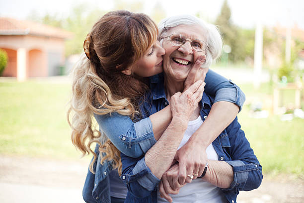 istock A mother and daughter hugging each other  472359264