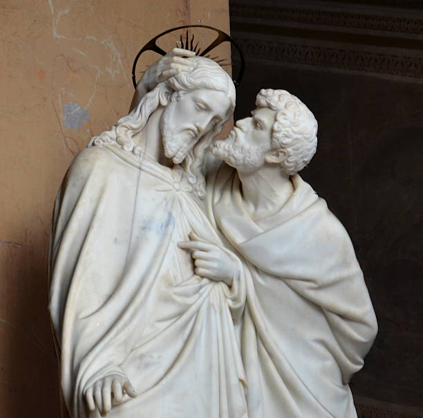 Judas kissing Jesus Judas kissing Jesus, by Ignazio Jacometti (1854), marble 3 x 1,6 m. The sculpture is located in front of the chapel of St. Lawrence, where the Holy Stairs (Scala Sancta) is placed, nearby the Saint John at Lateran Church. judas stock pictures, royalty-free photos & images