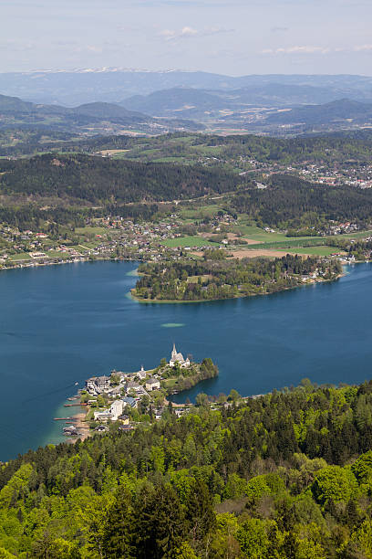 View From Observation Tower To Lake Woerth Taken on April 22nd, 2015 during a break at university. Perfect sunny and warm weather to use the freetime and enjoy the view from up there! Always worth a visit! pörtschach am wörthersee stock pictures, royalty-free photos & images