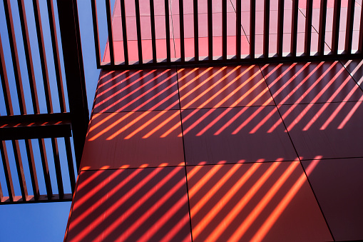 Shadows on Colourful Wall of Building