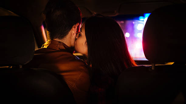 https://media.istockphoto.com/id/472367034/photo/girl-leaning-over-to-kiss-her-boyfriend-goodnight-in-car.jpg?s=612x612&w=0&k=20&c=KWZ_d08ofcF4uLET8nZoljIaltotfPwMWitqxO6mWrc=