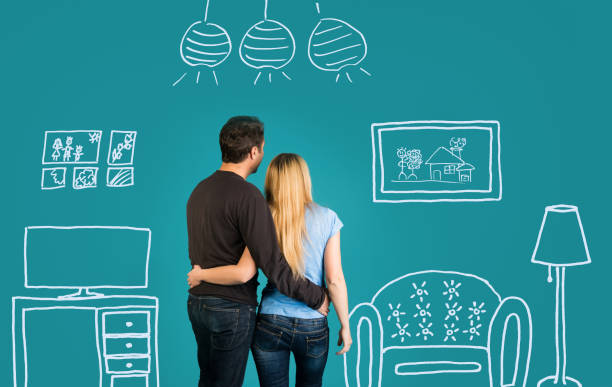 istock Family With Sketch Drawing Of Their Future Flat Interior. 472368262