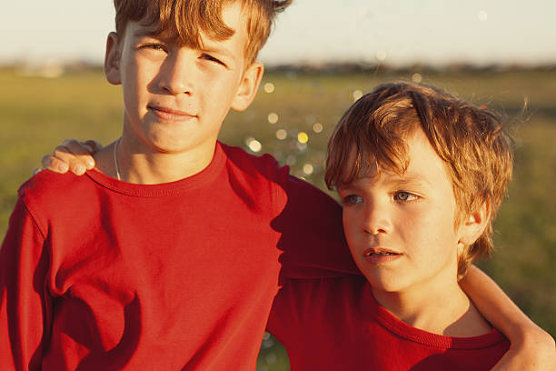 istock Portrait of two happy brothers 472369178