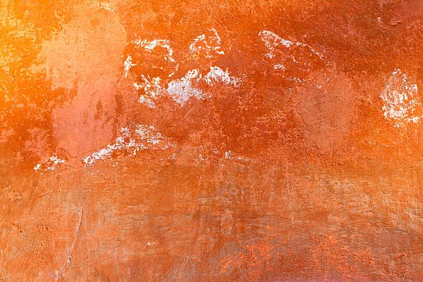 istock Vibrant Old Orange Roman Wall Background Texture 472372234