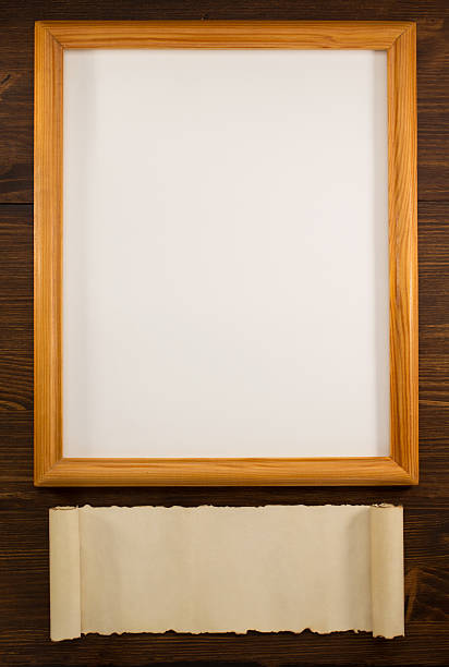 istock photo picture frame on wood 472381424