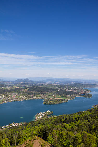 View From Observation Tower To Lake Woerth Taken on April 23rd, 2015 during a break at university. Perfect sunny and warm weather to use the freetime and enjoy the view from up there! Always worth a visit! pörtschach am wörthersee stock pictures, royalty-free photos & images