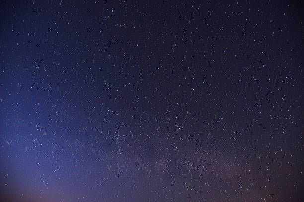 istock Dark blue night sky filled with stars 472382166