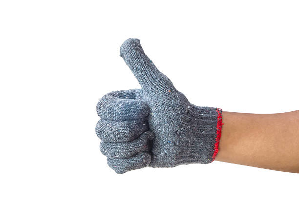 istock worker hand with thumb up after success 472385548