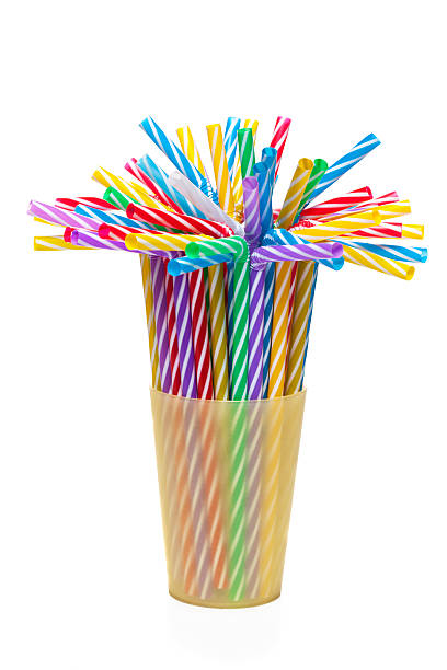 istock Many multicolored tubules in yellow glass 472386398
