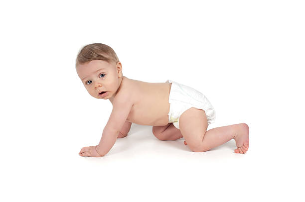 istock Side view of pretty crawling baby 472393772