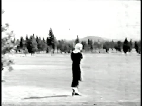 Female golfer, circa 1935