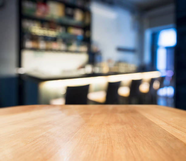 istock Table top counter with Blurred Bar restaurant background 472411524