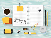 istock close up look at workplace objects in flat design 472419170