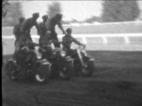 Group of motorcycle stunt riders--From 1930's film