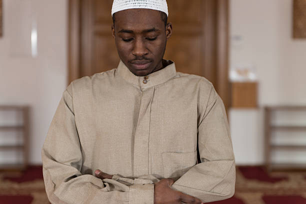 istock African Muslim Man Is Praying In The Mosque 472463778