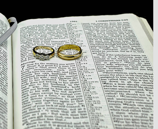 istock Bible and Wedding Rings Corinthians on Marriage 472466148