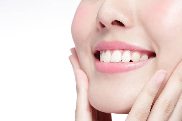 istock young woman health teeth 472467200