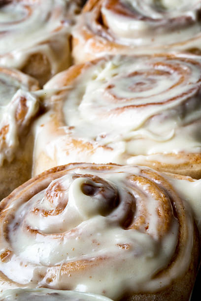 istock Fresh Baked Cinnamon rolls with creamy frosting 472468674