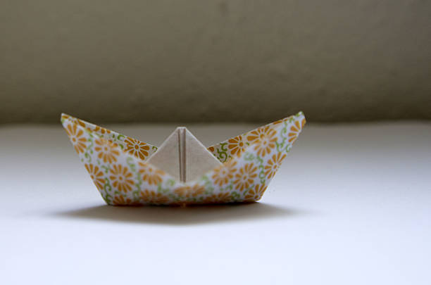 istock Colorful paper boat 472472931