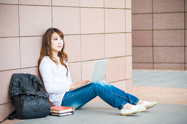 istock Asian female college or university student 472473794