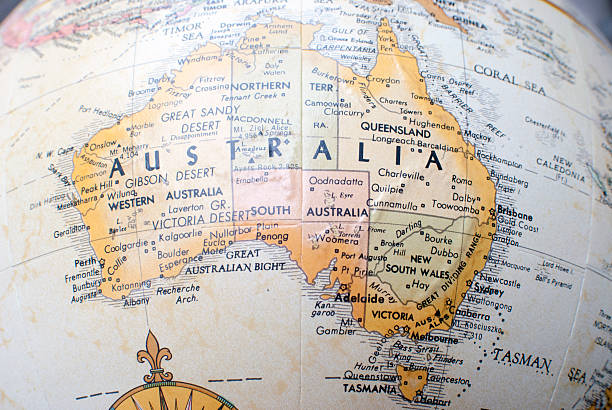 Map of Australia on a world Atlas Close up of Australia on a world Atlas tasman sea stock pictures, royalty-free photos & images