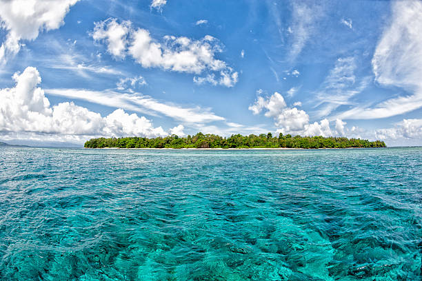 istock Siladen turquoise tropical paradise island 472475178