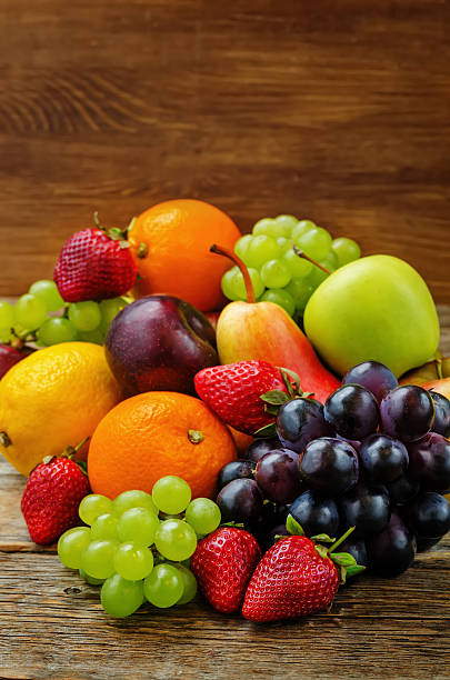 istock fruits. mango, lemon, plum, grape, pear, orange, Apple, banana, strawberry 472475720