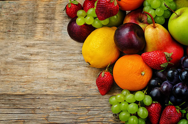istock fruits. mango, lemon, plum, grape, pear, orange, Apple, banana, strawberry 472476058