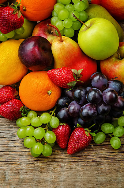 istock fruits. mango, lemon, plum, grape, pear, orange, Apple, banana, strawberry 472476066