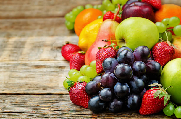istock fruits. mango, lemon, plum, grape, pear, orange, Apple, banana, strawberry 472476074