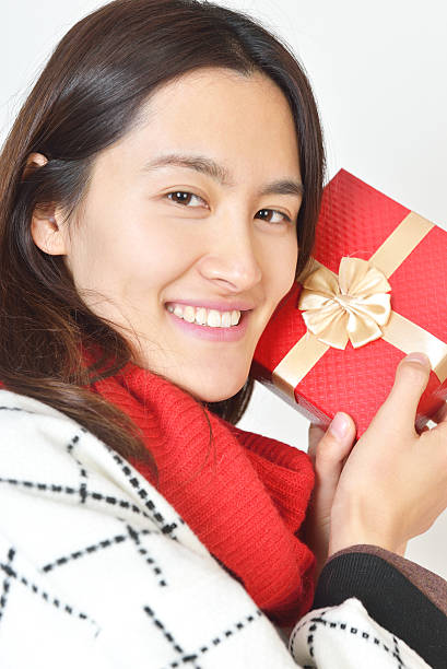 istock girl with her gift. 472476212