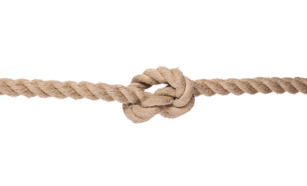 istock Rope with a knot tied in it isolated on a white background 472476848