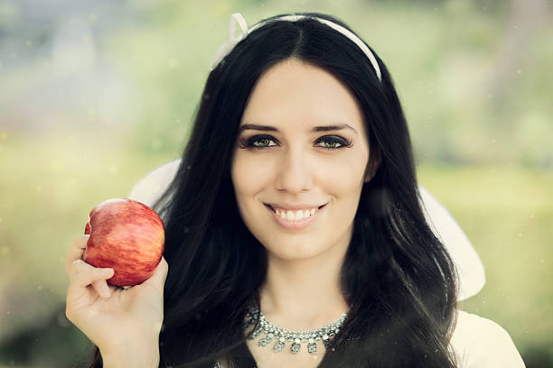 istock Snow-White with the Famous Red Apple 472477670