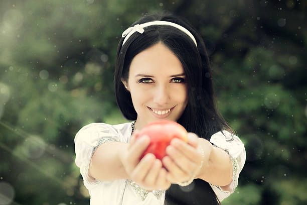 istock Snow-White with the Famous Red Apple 472478160