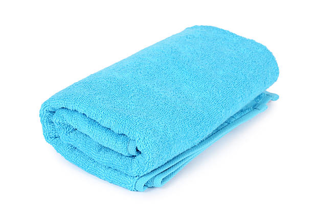 istock Blue towel isolated on white background 472479808