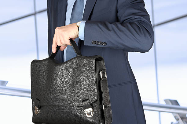 istock businessman checking time on his watch . 472481930
