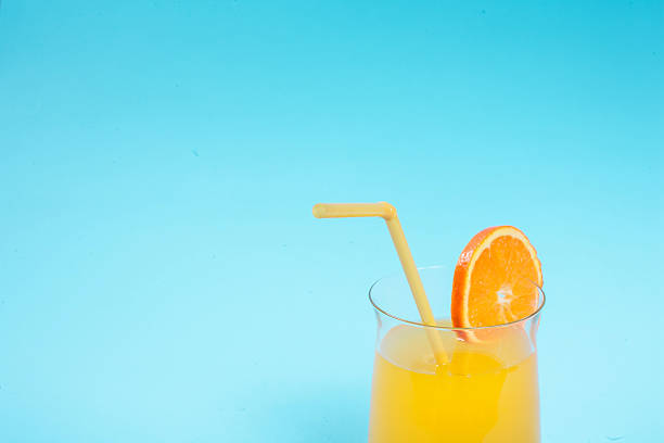 istock Orange juice in glass 472482400